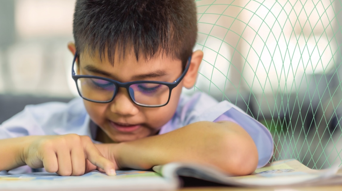 A young boy reading